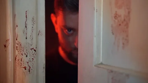Horror serial killer haunting his victim, mentally ill maniac looking from dark Stock-Footage 124169697