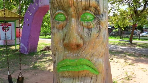 Horror tree with spooky face and swing Khon Kaen Thailand. Stock Footage 316828181