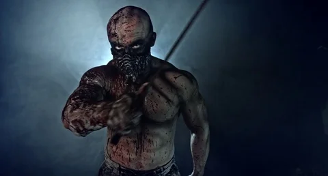 Horror zombie killer with a chainsaw and a machete. Postapokalipsis. 库存影片 70928027
