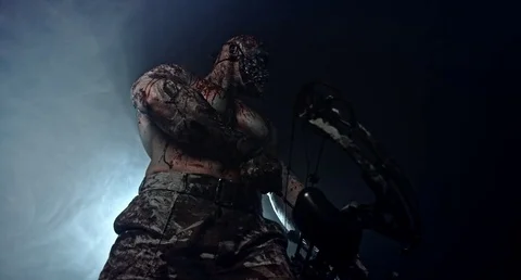 Horror zombie killer with a crossbow. Postapokalipsis. Stock Footage 70932677