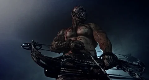 Horror zombie killer with a crossbow. Postapokalipsis. 库存影片 70933019