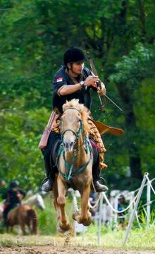 Horseback archery Stock Photos