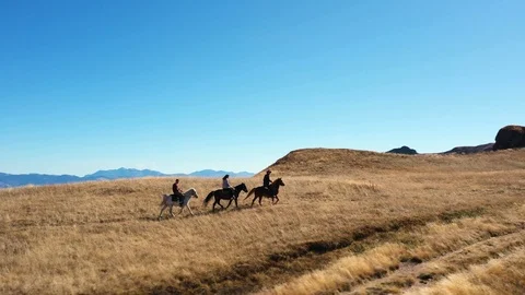 Horseback mountain riding Stock Footage 119385075