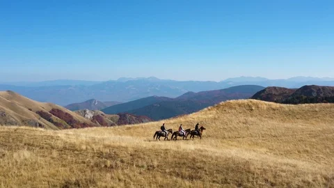 Horseback mountain riding Stock Footage 119385828