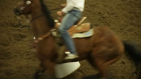 Horseback Rider Knocks Over A Barrel while Barrel Racing Stock Footage 50143018