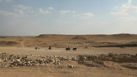 Horseback riders in the Giza Desert Stock Footage