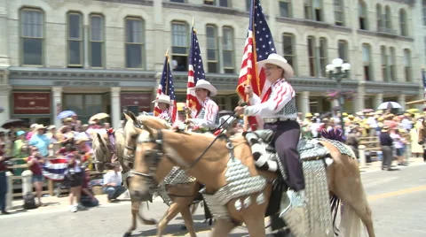 Horseback Riders in a parade Stock Footage 62243893