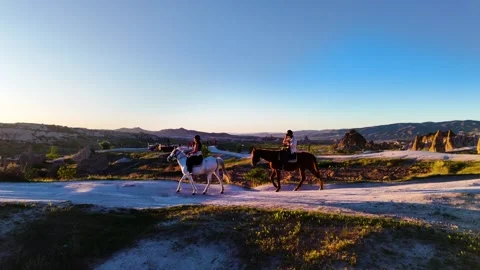 Horseback Riding in the Sunset View Stock Footage 274098301