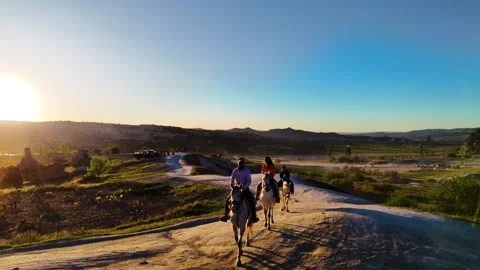 Horseback Riding in the Sunset View Stock Footage 274098479