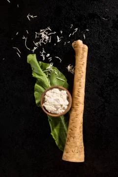Horseradish root and leaves. Stock Photos