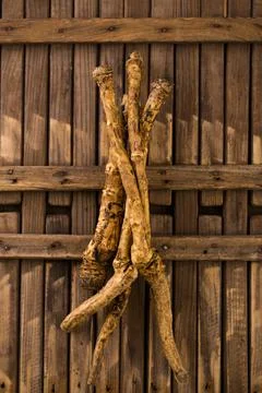 Horseradish root on a rustic background Foto stock