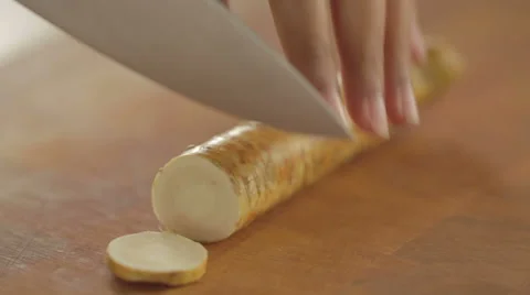 Horseradish sliced in kitchen Video stock 42142349