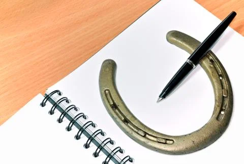 Horseshoe on table Stock Photos