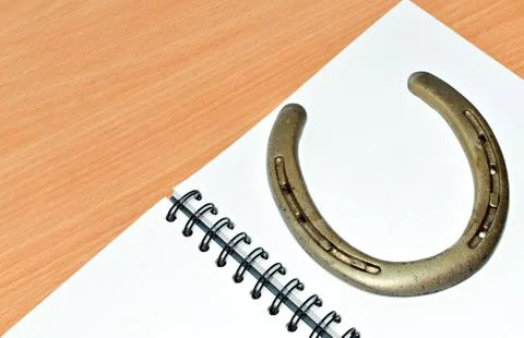 Horseshoe on table Stock Photos