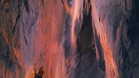 Horsetail fall illuminated by sunset light in Yosemite National Park, California 스톡 동영상 245839544