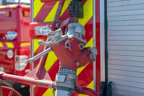 Hose coupling on the fire hydrant in pumper Stock Photos