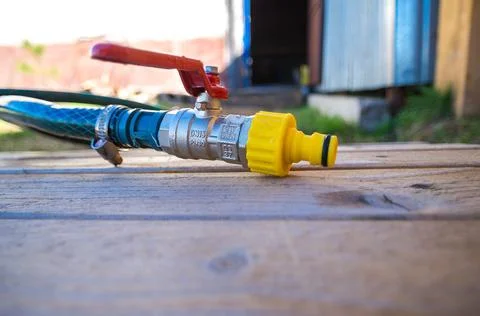Hose on the ground, ready for use Stock Photos