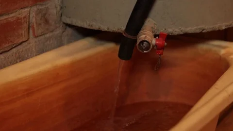 Hose water pours Stock Footage 129137277