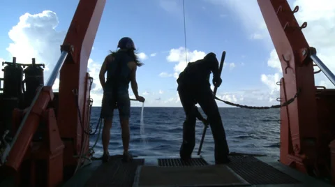 Hosing down the Bongo nets before bringing them aboard Stock Footage 36465100