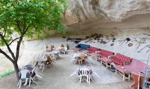 The hospitable view of the old cafe of a high-rise Turkish courtyard in Cappa Stock Photos