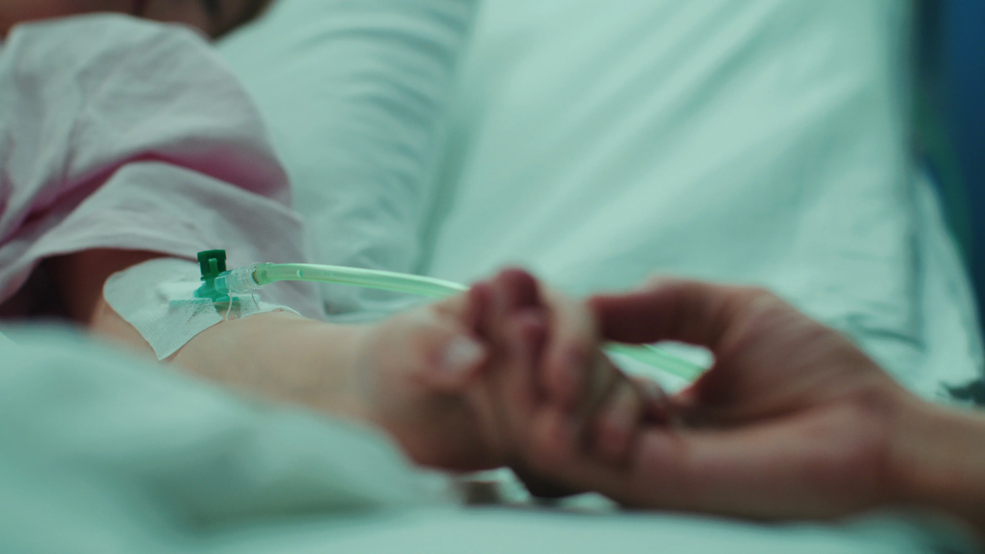 In Hospital Closeup Sick Sleeping Child in Bed Mother Holds Hand