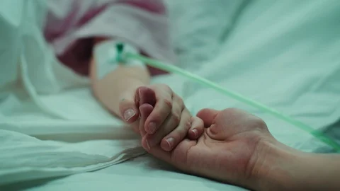 In Hospital Closeup Sick Sleeping Child in Bed Mother Holds Hand Stock Footage