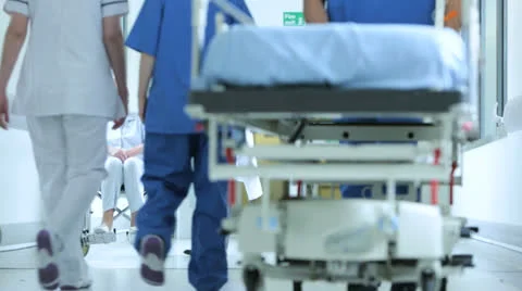 Hospital Corridor Busy With Staff Patients Stock Footage