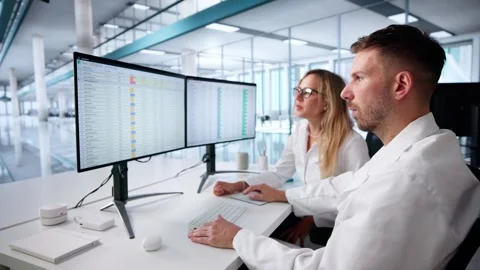 Hospital Doctor Using Spreadsheet For Billing Codes Stock Footage 317394257