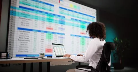 Hospital Doctor Using Spreadsheet For Billing Codes Stock Photos
