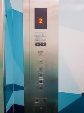 Hospital elevator button at 4 level storey floors building. Close up Stock Photos