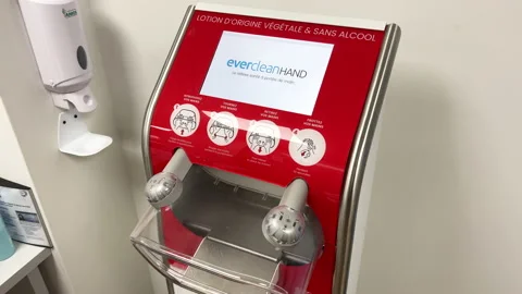 Hospital interior with Everlean Hand electronic device during COVID pandemic Stock Footage 206862249