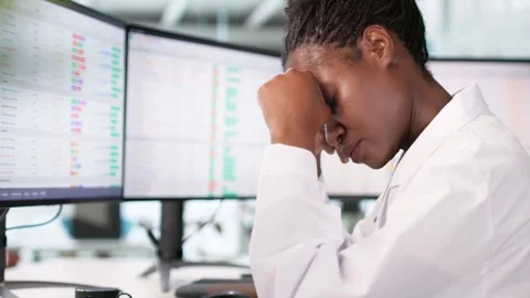 Hospital Nurse Frustrated Using Data Spreadsheet Stock Footage 313752300