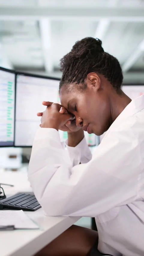 Hospital Nurse Frustrated Using Data Spreadsheet Stock Footage 313752751