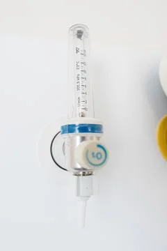 Hospital oxygen flow meter regulating respiratory therapy Stock Photos