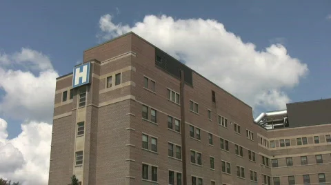 Hospital with timelapse clouds. Stock Footage