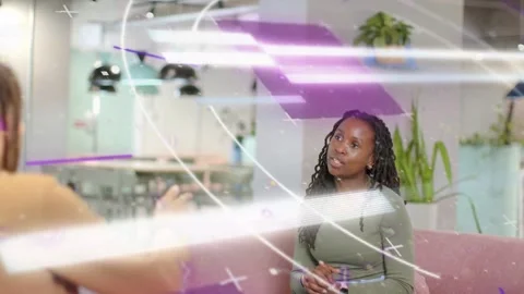 Host asking work questions while right woman answering with phone white purple Stock Footage 333594668