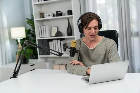 Host channel broadcaster talking show with script and smartphone. Pecuniary. Stock Photos