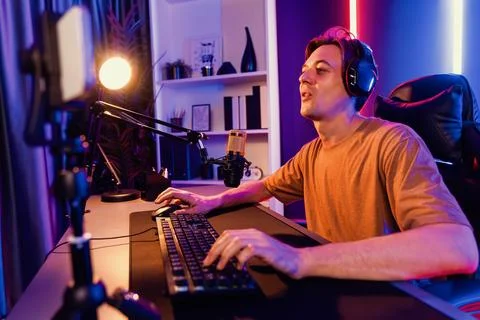Host channel of smart streamer playing online game to be winner. Pecuniary. Stock Photos