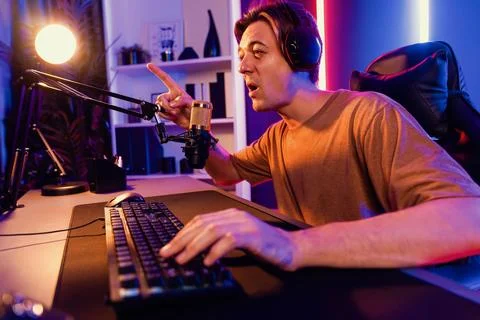 Host channel of smart streamer playing online game to be winner. Pecuniary. Stock Photos
