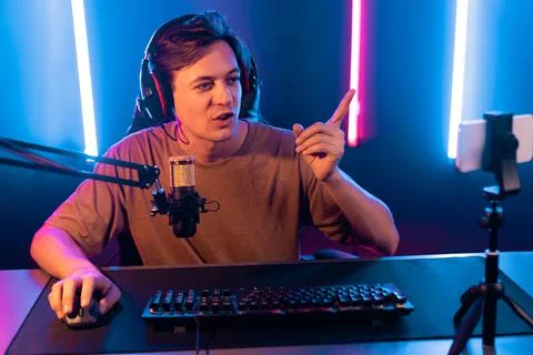Host channel of smart streamer playing online game to be winner. Pecuniary. Stock Photos