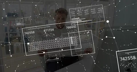 Host demonstrating status at tech desk gesturing, AR layer starting, updating Stock Footage 331198171