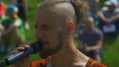 Host of event says something in the microphone Stock Footage 82406663