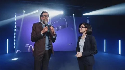 Host interviewing virtual reality glasses creator Stock Photos