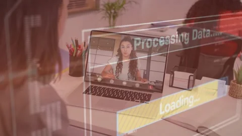 Host on laptop speaking as Processing Data HUD loading bar filling then receding Stock Footage 320650890