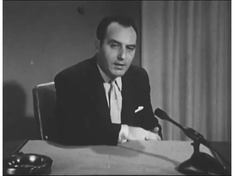 Host Paul Coates introduces a program on barbiturate addiction, in 1955. Video stock 74936260