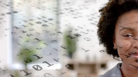Host starting speaking, binary code scrolling across foreground, smiling, Video stock 333256123