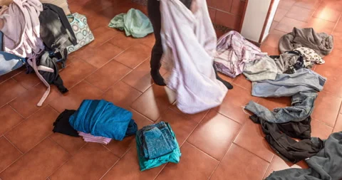 The hostess cleans the living room. Stock Footage 138582314
