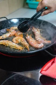 The hostess of the house, woman's hands while cooking some exquisite large .. Stock Photos