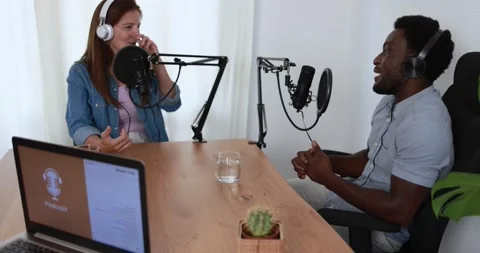 Hosts having podcast session together - Female speaker making an interview Видео 161637774