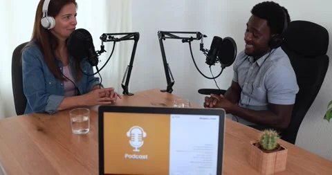 Hosts having podcast session together - Female speaker making an interview Stockbeeldmateriaal 161637905